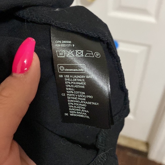 Black mini dress with lace back and lace side detail. - Picture 5 of 7